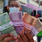 Hukum Tukar Uang Jelang Lebaran, Termasuk Riba?
