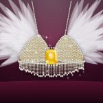 Ilustrasi Fantasy Bra Kylie Jenner bertabur berlian dengan batu kuning di tengah dan sayap bulu putih di atas latar beludru